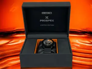 The Seiko Mod Black 'n' Orange in the elegant watch box.